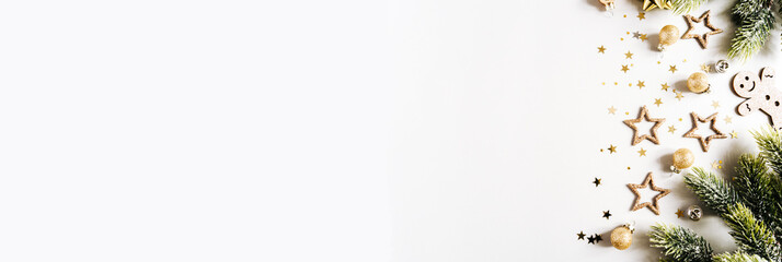 Christmas or New year banner with various golden decorations on grey background