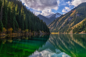 Fototapeta na wymiar Picturesque alpine lake Kolsai in the vicinity of the Kazakh city of Almaty