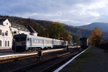 railroad and train against the backdrop of mountains. Railway. trains. mountain landscape Ukraine Carpathians