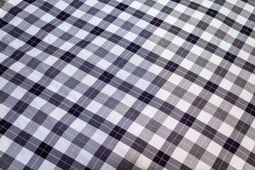 Old cotton fabric in black and white check