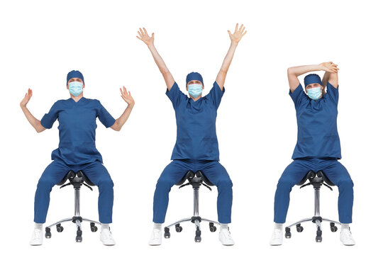 Professional  medical male,stretching arms, back,neck   sitting on mobile saddle - front view