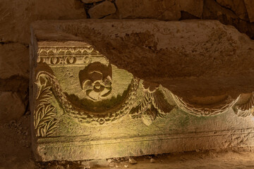 Close up of the beautiful  carving on a sarcophagus in the Cave of the Coffins at Bet She'arim in...
