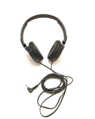 Side view black wired headphone with swiveling earcup foam cushions, L-shaped stereo mini plug...