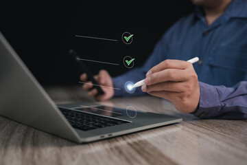 Digital Business Survey Checklist : Businessman using Stylus pen with laptop Evaluating Assessments Online , Surveys and Assessments , Maximizing Efficiency or Streamlining Success in the Digital Age	