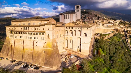 Poster Italy . Impressive medieval Assisi town in Umbria and religious landmark.  aerial drone panoramic view. italian travel and best destinations © Freesurf