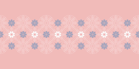 Delicate Christmas seamless vector pattern Border with lace snowflakes and circles on pink background. Great for Christmas wrapping paper, greeting cards and posters.