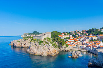 View of Fort Lovrijenac or St. Lawrence Fortress from Dubrovnik city wall. Fort Lovrijenac fortress,. Dubrovnik is a historic city in Croatia region of Dalmatia. UNESCO World Heritage Site - obrazy, fototapety, plakaty