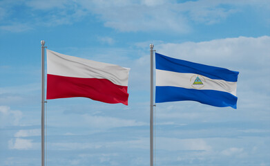 Nicaragua and Poland flags, country relationship concept
