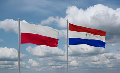 Paraguay and Poland flags, country relationship concept