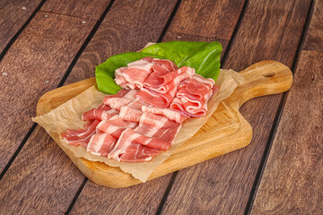 Sliced pork bacon in the bowl