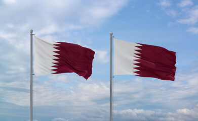 Two Qatar flags, country relationship concept