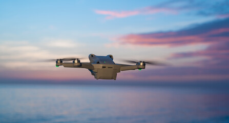 small drone flying against a magnificent sunset seascape. 