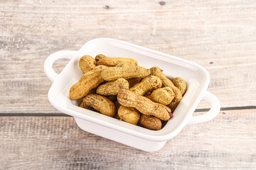 Raw ripe unpeeled peanut heap