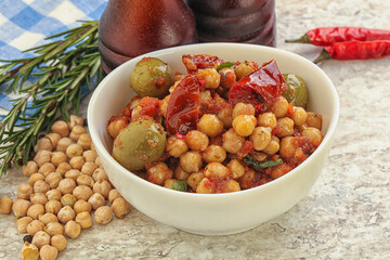 Chickpea beans with dry tomato and olives