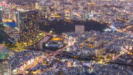 Aerial view of Ho Chi Minh City skyline and skyscrapers in center of heart business at Ho Chi Minh City downtown. Bridges and many buildings, local houses