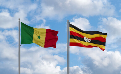 Uganda and Senegal flags, country relationship concept