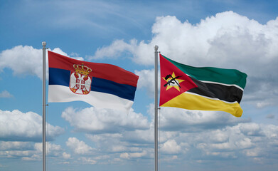 Mozambique and Serbia flags, country relationship concept