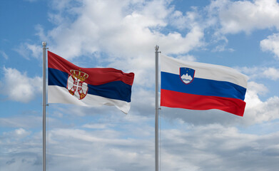 Slovenia and Serbia flags, country relationship concept