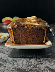 Front view of an apple and ginger spelt loaf cake