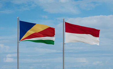 Indonesia and Seychelles flags, country relationship concept