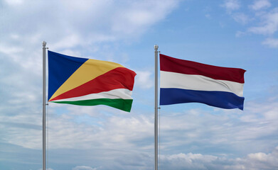 Netherlands and Seychelles flags, country relationship concept