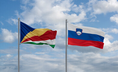 Slovenia and Seychelles flags, country relationship concept