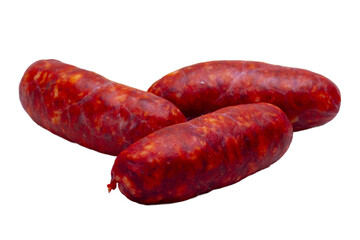 Three fresh chorizos with a piece of Idiazábal sheep cheese on a white plate