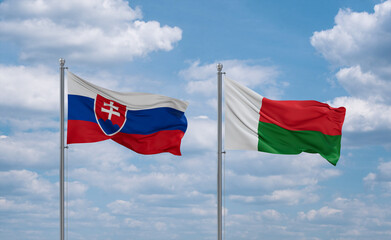Madagascar and Slovakia flags, country relationship concept
