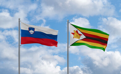 Zimbabwe and Slovenia flags, country relationship concept