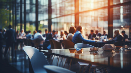 Blurry photo of a big modern corporate office with business people