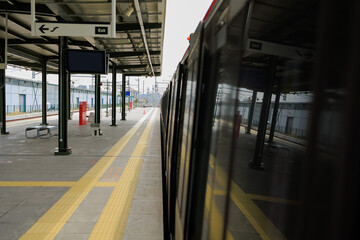 Metro station and rail lines on Istanbul city street, marmara line