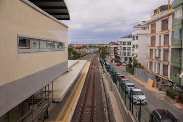 Metro station and rail lines on Istanbul city street, marmara line