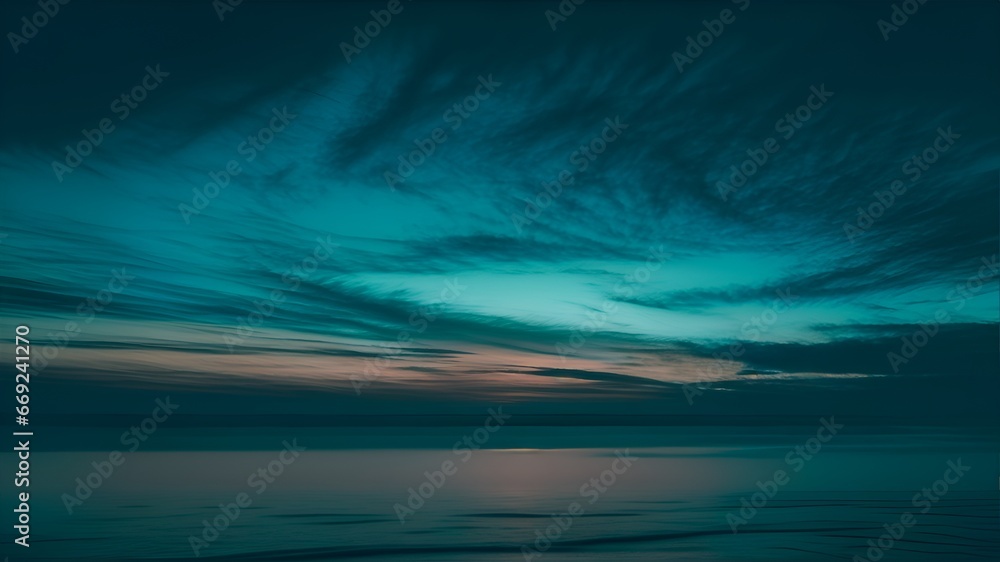 Wall mural the teal ombre sky at dusk paints a mesmerizing picture of the evening horizon. this photograph capt