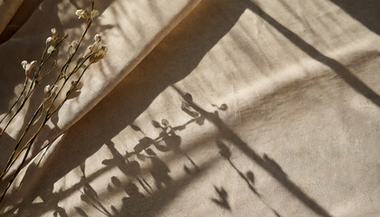aesthetic natural minimalistic background elegant sunlight floral shadows on neutral beige linen texture pleated tablecloth background with copy space