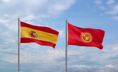 Kyrgyzstan and Spain flags, country relationship concept