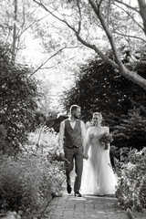 wedding walk of the bride and groom in a coniferous in elven accessories