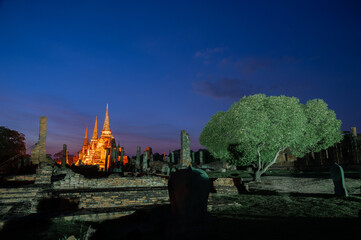 Night light of three pagoda of Wat Phra Sri Sanphet, famous historic site in Ayutthaya province, Thailand, twilight scene and smooth sky