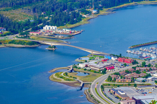 Aerial view of the Douglas Bridge spanning the Gastineau Channel between the historic city center of Juneau and Douglas Island in Alaska, USA