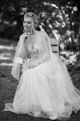 Fototapeta na wymiar portrait of a happy bride in a light light dress in wearing elven accessories