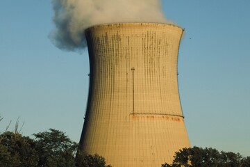Plume of water vapor rising from the Cooling Tower at a thermal nuclear reactor 
