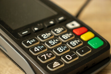 Obraz premium Closeup shot of a payment terminal keyboard, banking concept