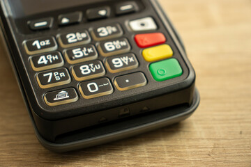 Obraz premium Closeup of a payment terminal keyboard in a banking concept.