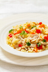 Chicken Fried Rice with vegetables in white bowl