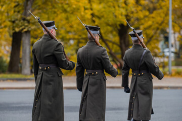 Latvian national guard marching and switching guards