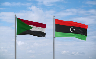 Libya and Sudan flags, country relationship concept