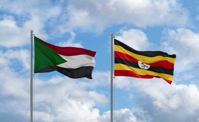 Uganda and Sudan flags, country relationship concept