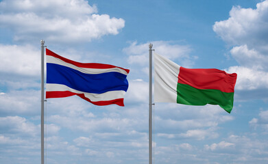 Madagascar and Thailand flags, country relationship concept