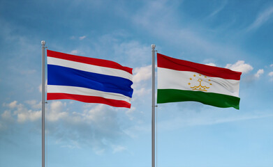 Tajikistan and Thailand flags, country relationship concept