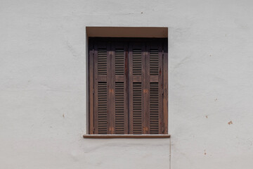 old window with shutters