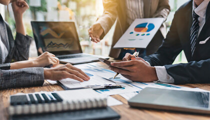 Co working conference, Business team meeting present, investor colleagues discussing new plan financial graph data on office table with laptop and digital tablet, Finance, accounting, investment